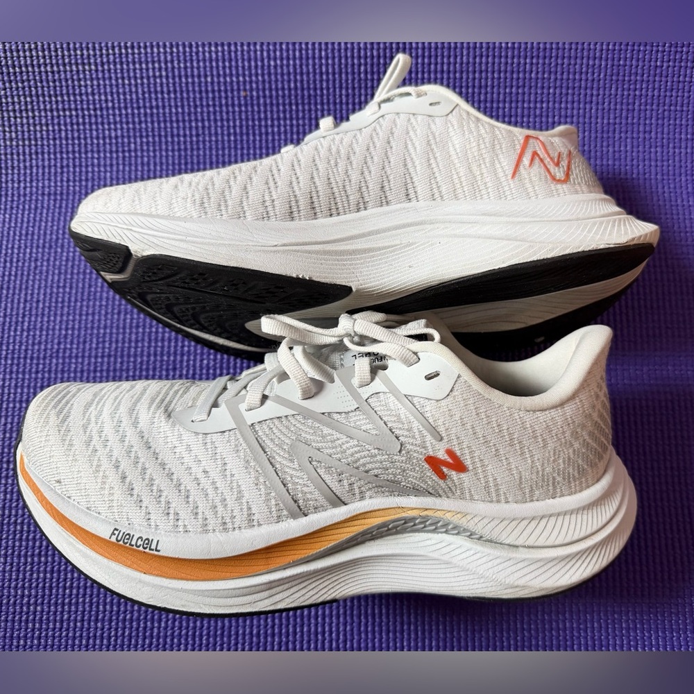 New Balance Women's White Sneakers with Orange Accent fuel cell